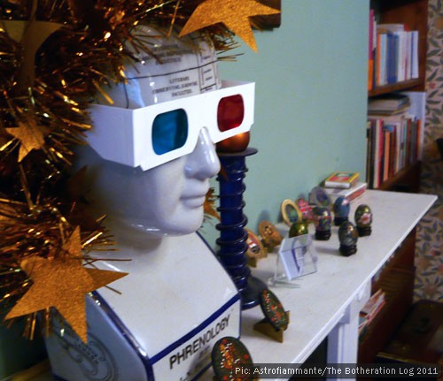 A phrenology head with Christmas decorations