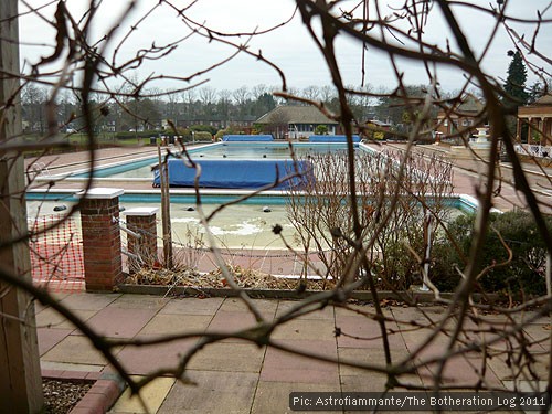 The outdoor pool is still frozen over.