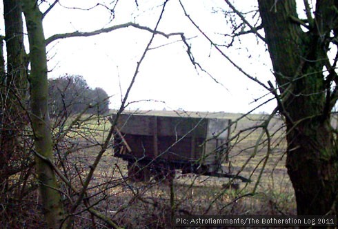 Farm wagon in a winter field