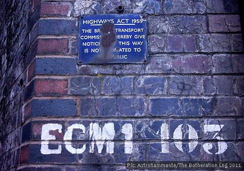 Sign and reference number on a railway viaduct