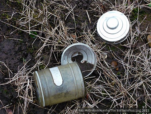 Jar with metal lid abandoned on allotment plot