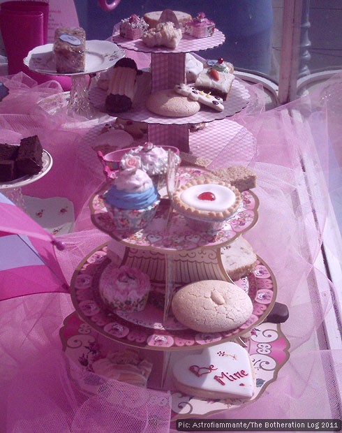 Cakes on a stand in a baker's window