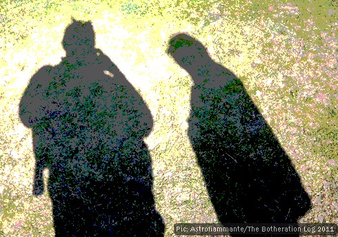 Shadows of two figures on the ground