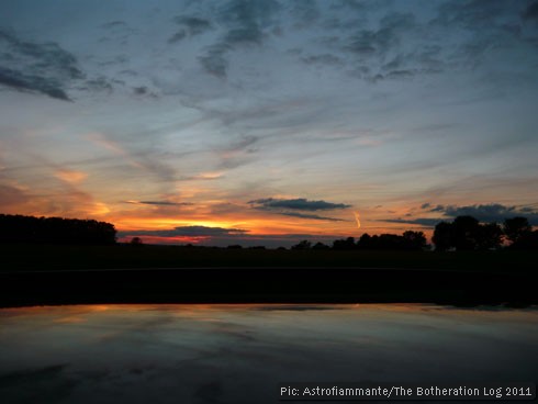 Sunset reflected in the vertical plane