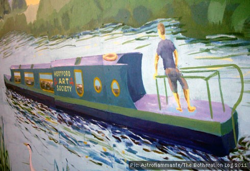 Mural showing a passing narrowboat