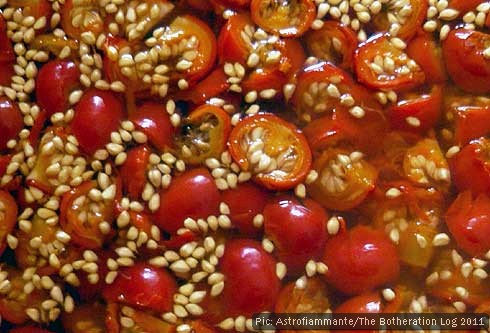 Chopped rose hips simmering in a pan