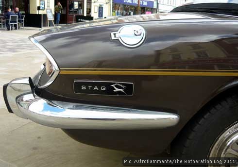 Nearside rear of a Triumph Stag showing badge with logo