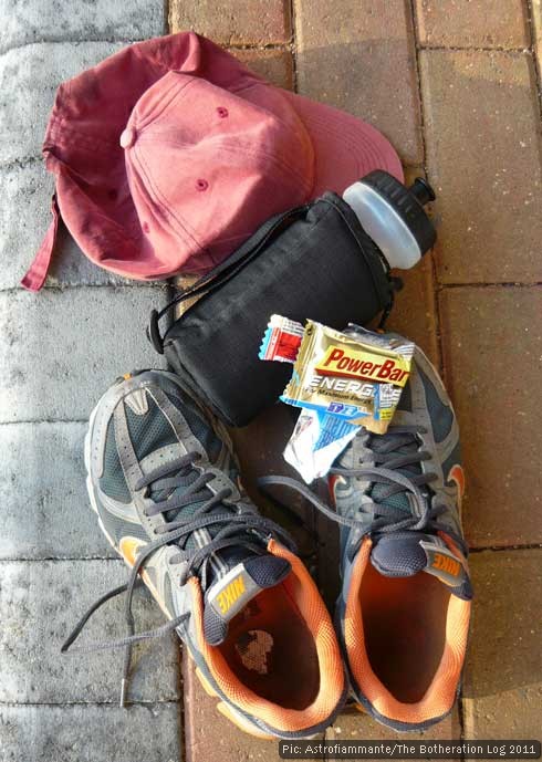 Running gear including shoes, hat, water bottle and energy bar