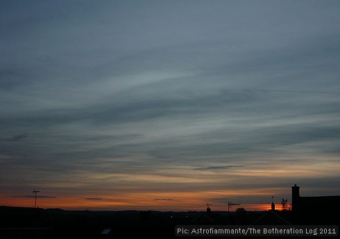 Grey-blue sky with cirrus cloud and remains of orange sunset