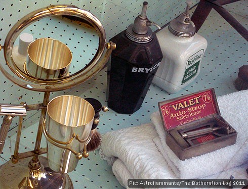 Vintage male grooming products in a barber's window