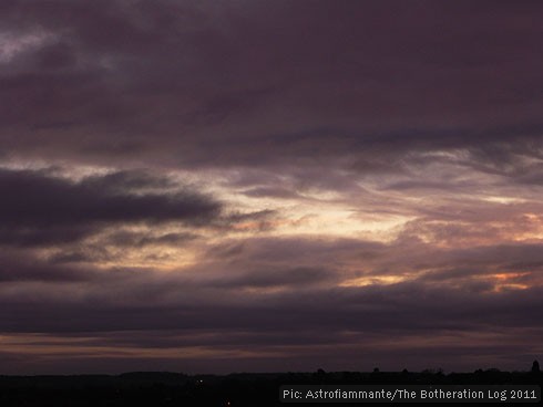 Rumpled purple clouds at sunset