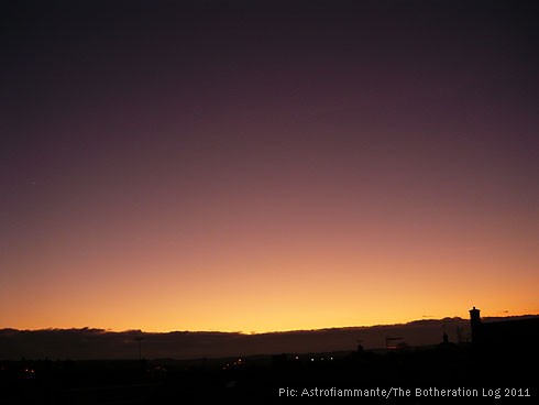 Purple, pink and gold sunset in a clear sky