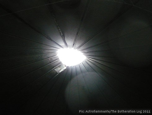 Circular gap in the roof of an agricultural storage building