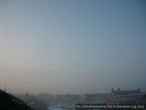 Misty sunrise on a snowy day