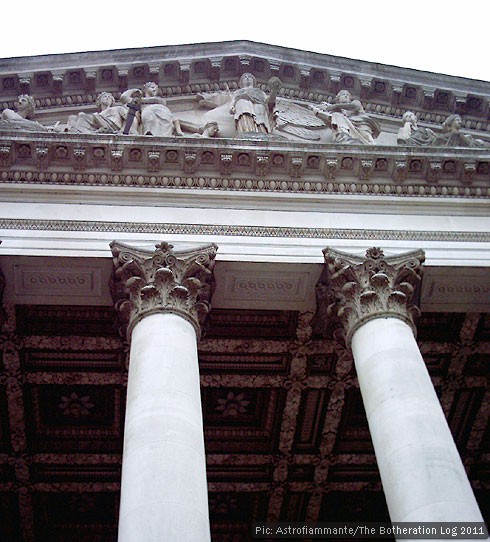 Classical frontage with pediment and columns featuring Corinthian capitals