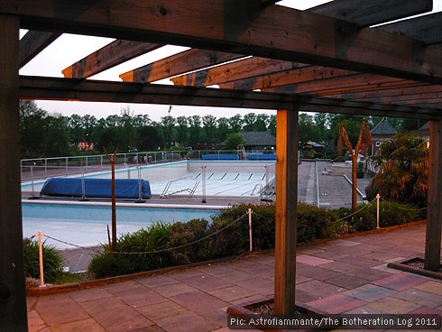 Open-air swimming pool standing empty
