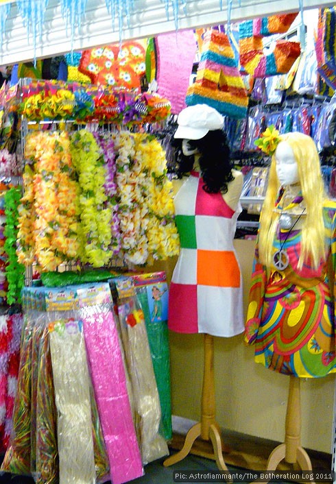 Fancy-dress market stall featuring 60s-style costumes