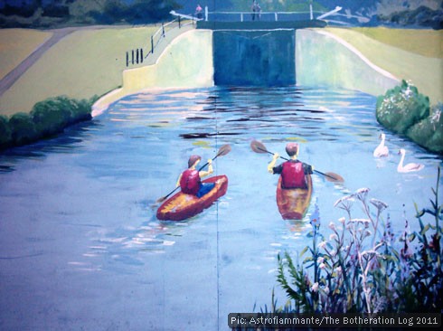 Mural showing canoeists on a canal