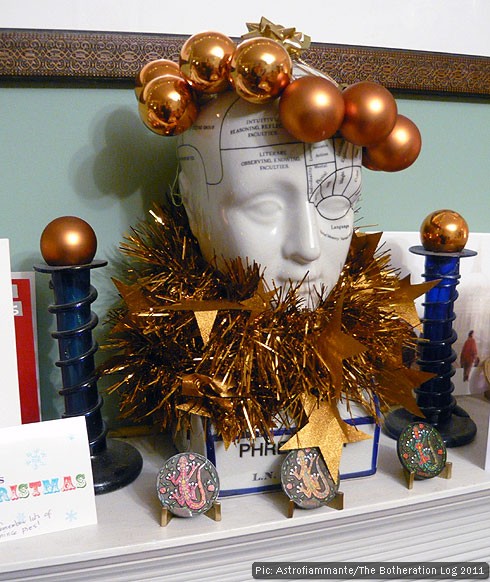 A phrenology head with a different set of Christmas decorations from the ones featured in our 2010/11 picture